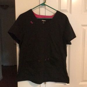 Scrub Top Black with Pink stitching. In Greatcondition. Left side has 2 pockets.